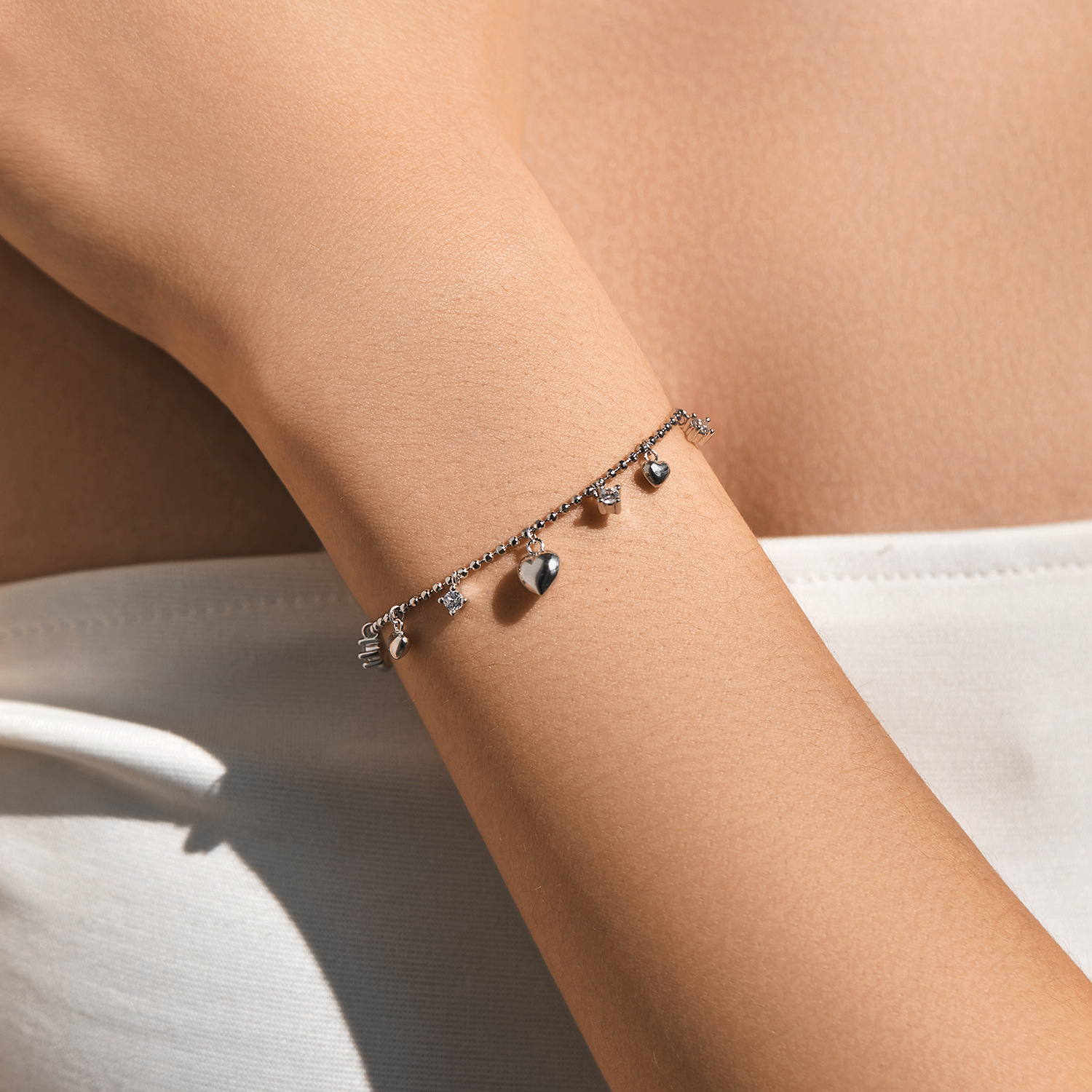 The S925 Sterling Silver Heart Rhinestone Tassel Bracelet - Image 2