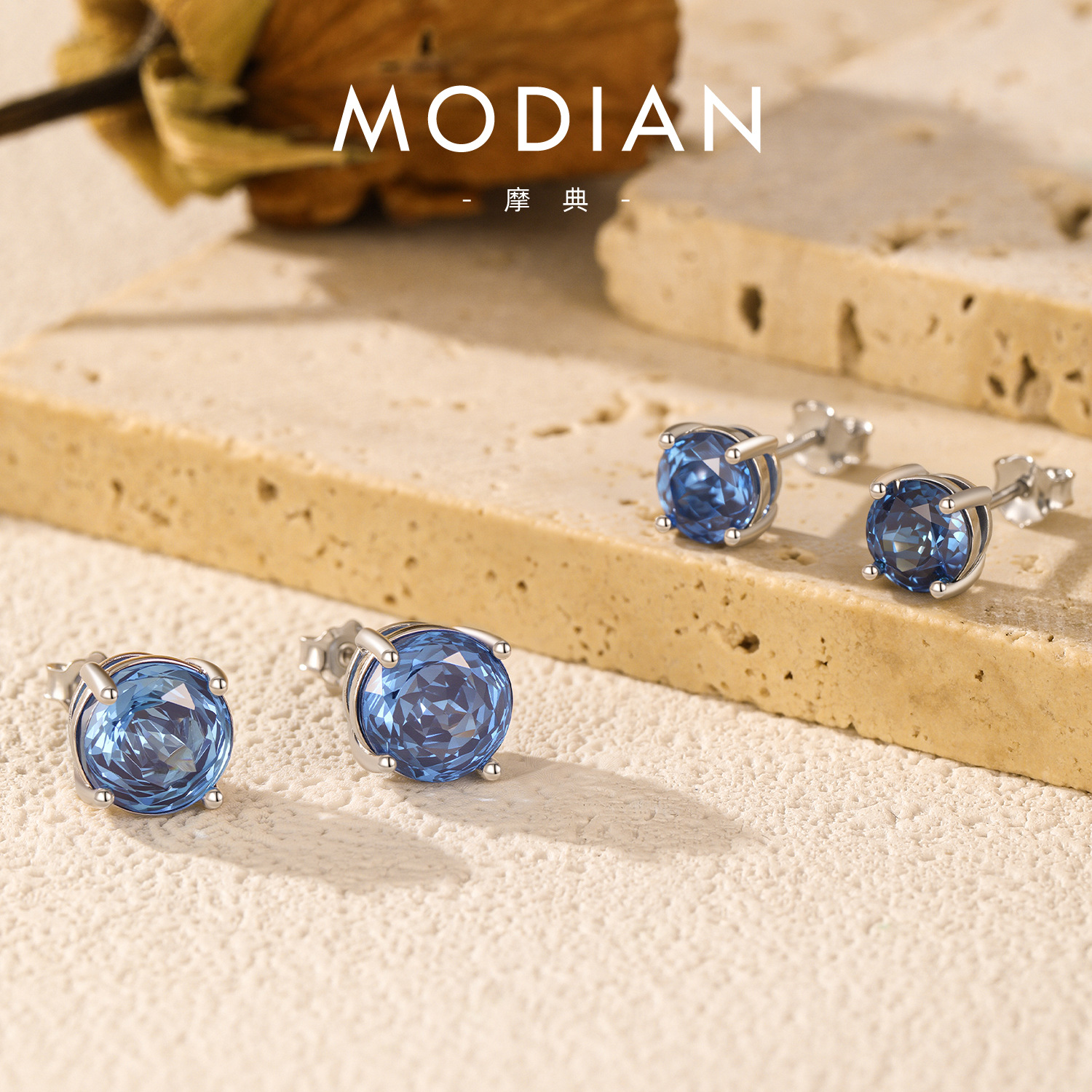 The S925 Sterling Silver Blue Rose Cut Simulated Diamond Earrings