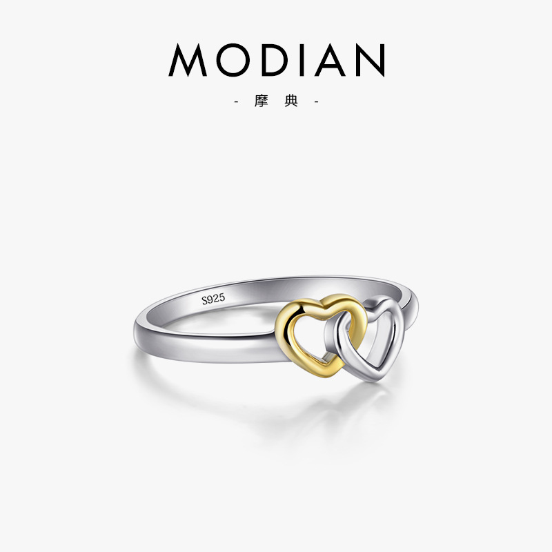 The S925 Sterling Silver Two-Tone Hollow Heart Ring