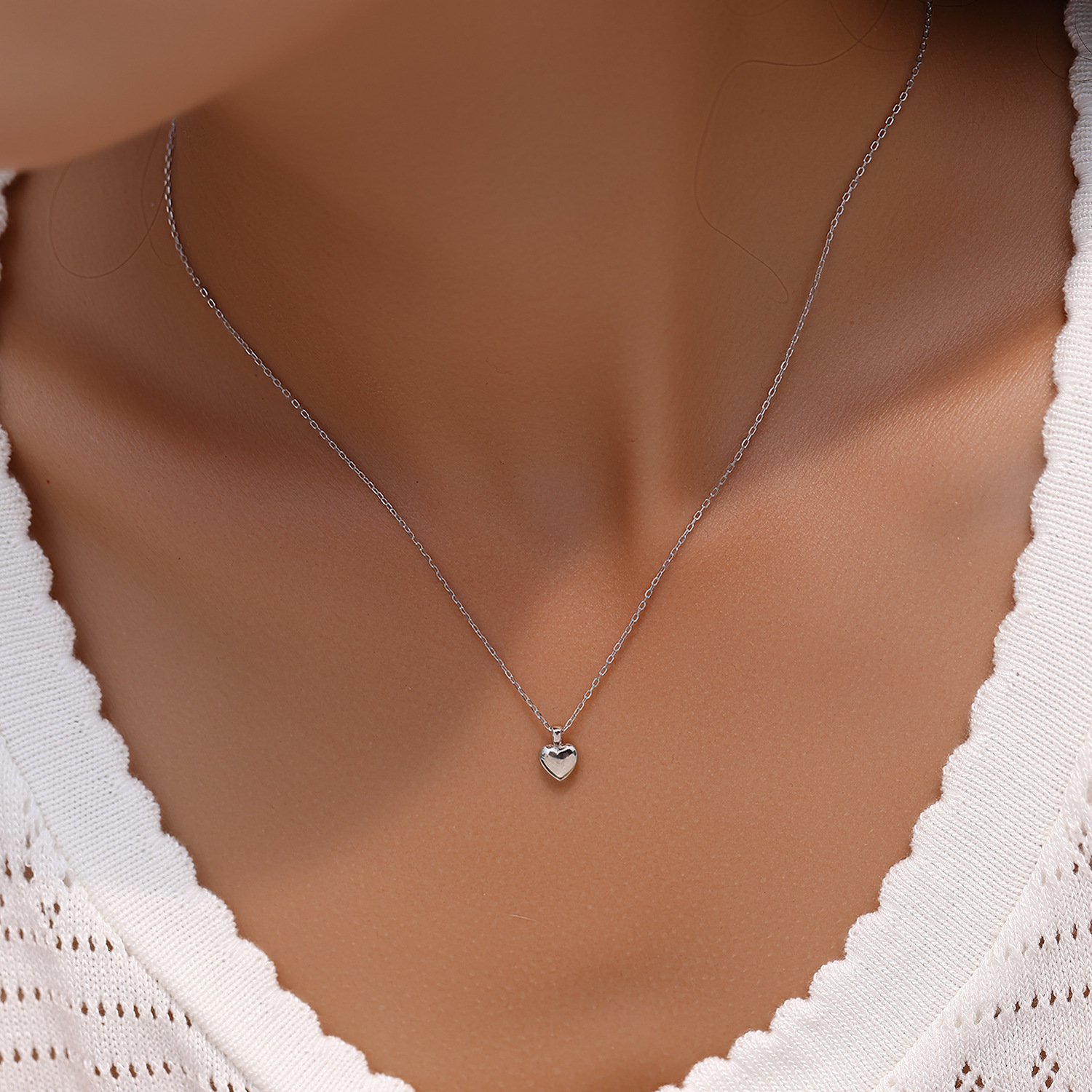 The S925 Sterling Silver Minimalist Heart Pendant Necklace - Image 2