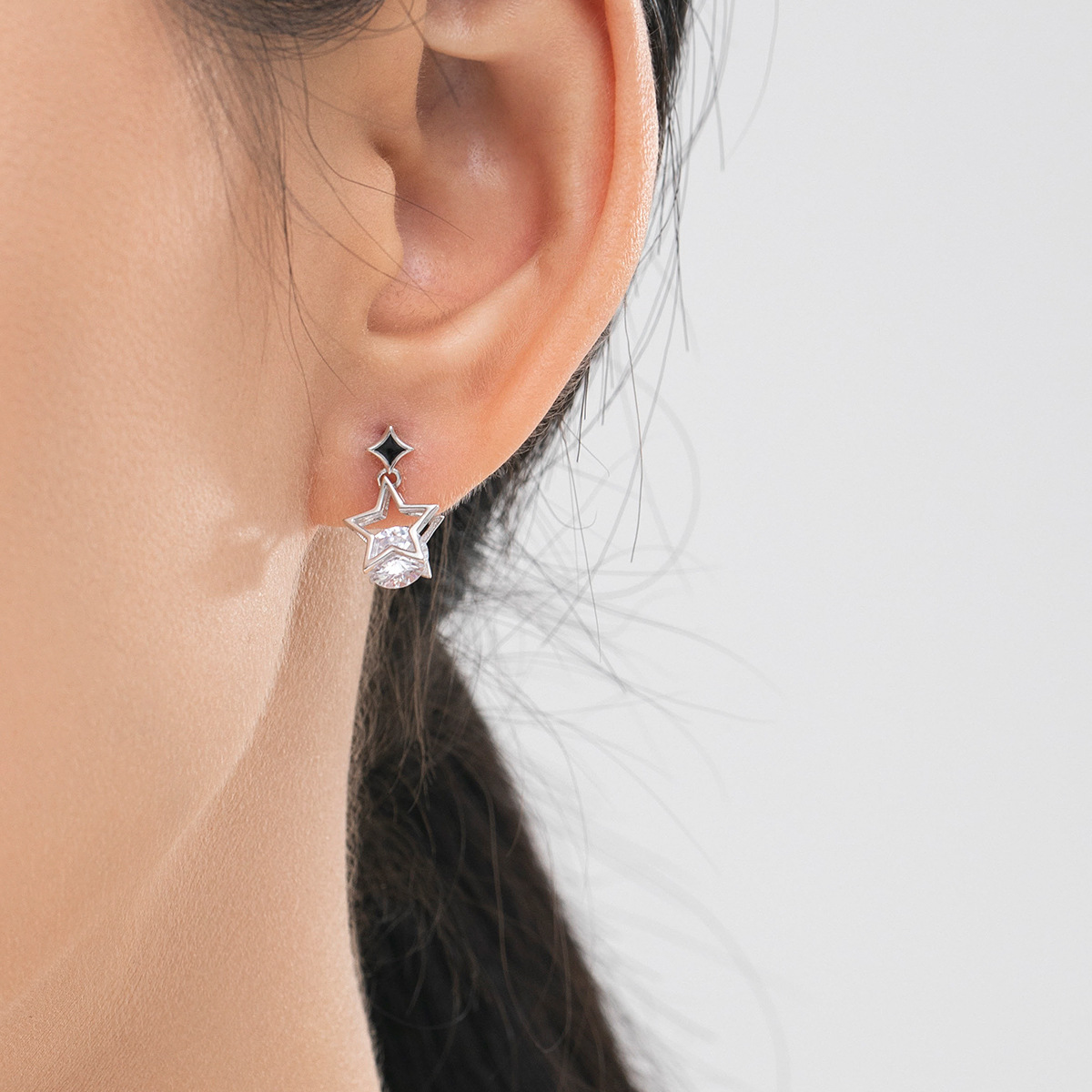 The S925 Silver Hollow Star Stud Earrings - Image 2