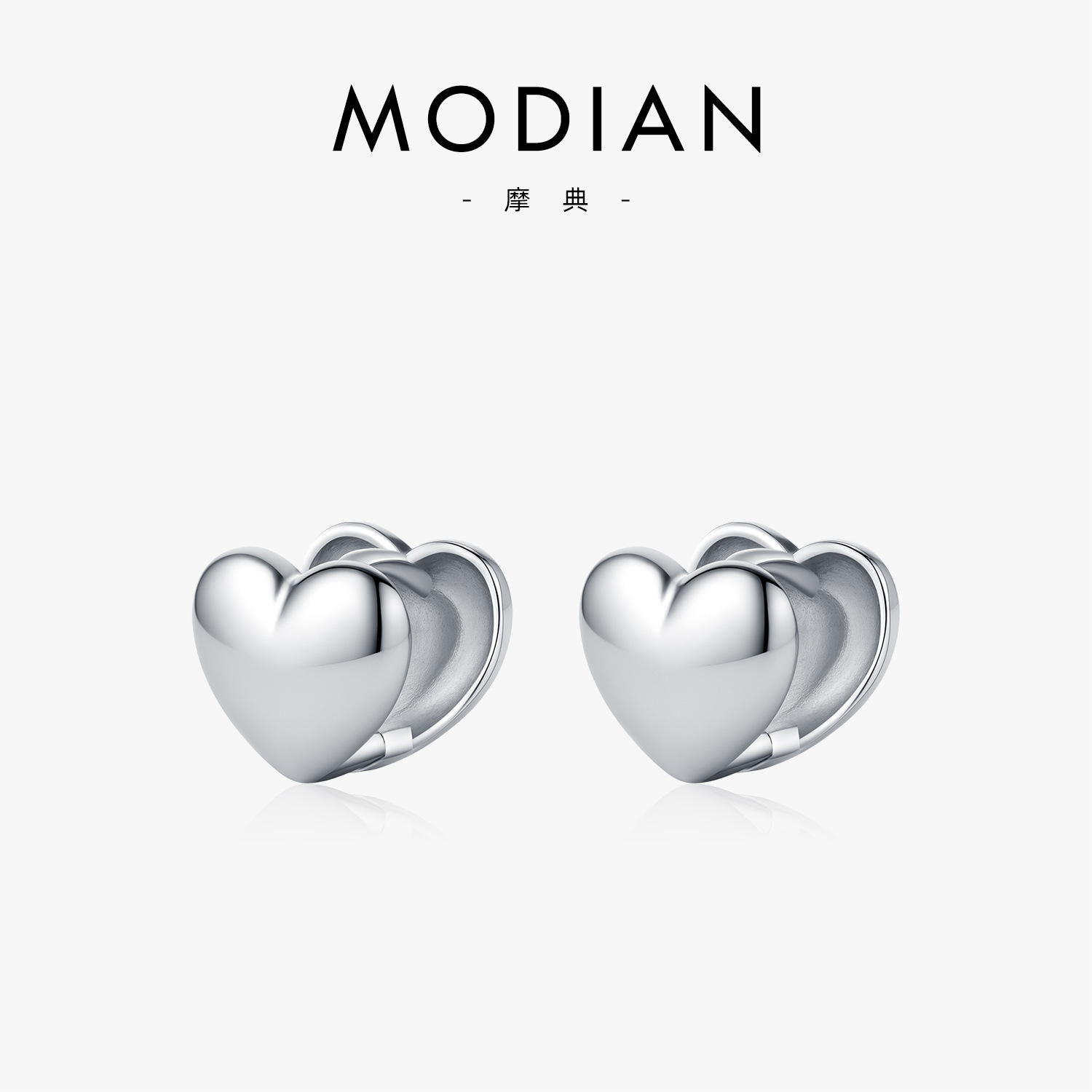 The S925 Silver Double-Sided Heart Earrings with Mirror Finish