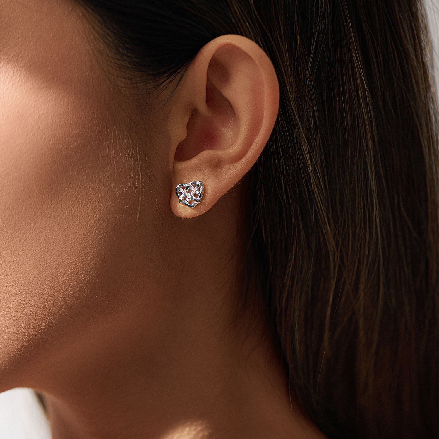 The S925 Sterling Silver Heart Hollow Woven Stud Earrings - Image 2