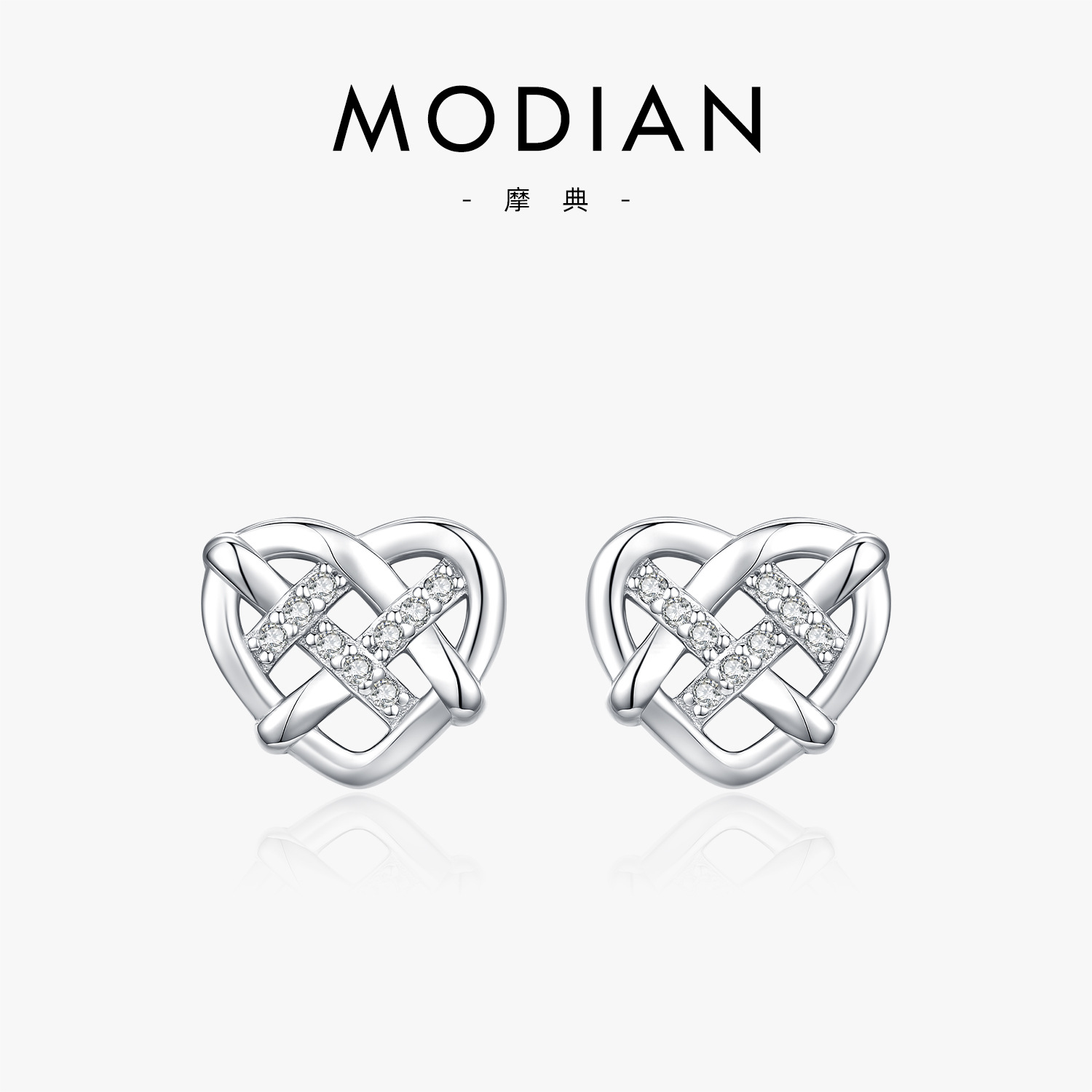 The S925 Sterling Silver Heart Hollow Woven Stud Earrings