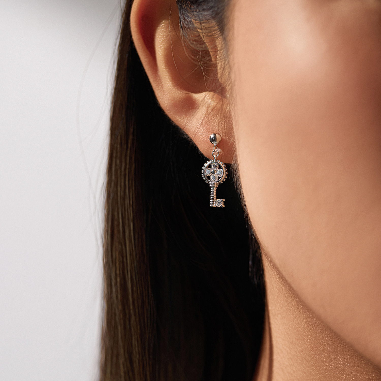 The Moissanite S925 Sterling Silver Asymmetric Key Lock Earrings - Image 2