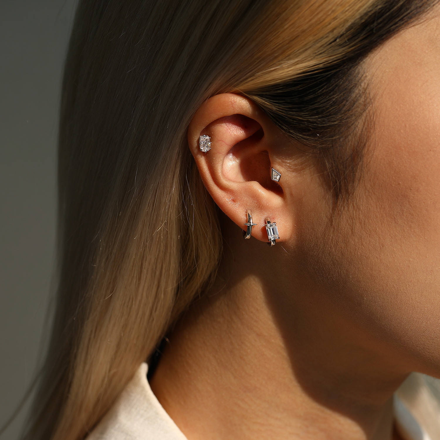 The S925 Sterling Silver Heart Twist Earrings with Moissanite - Image 2