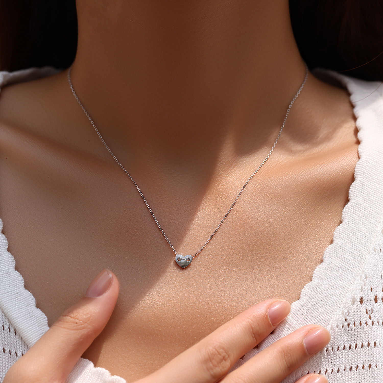 The S925 Sterling Silver Minimalist Heart Pendant Necklace - Image 2