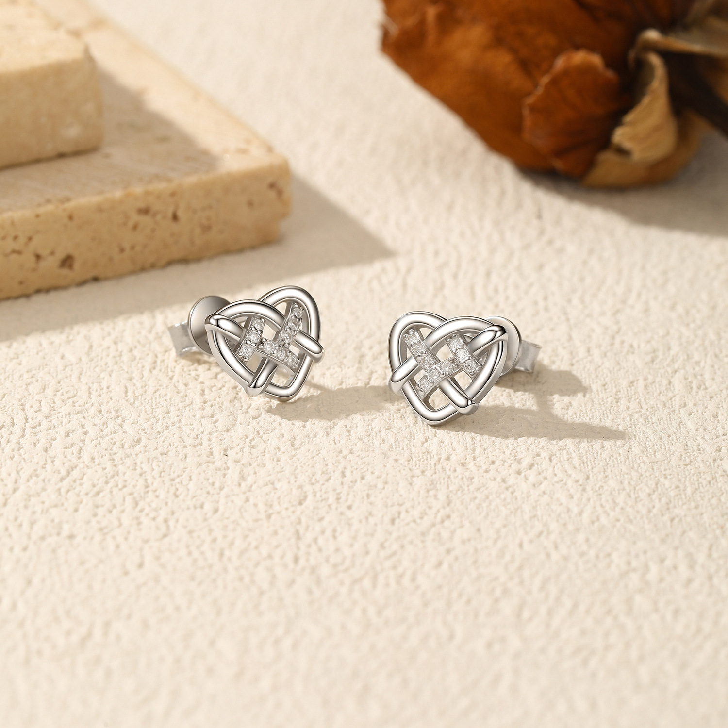 The S925 Sterling Silver Heart Hollow Woven Stud Earrings - Image 4